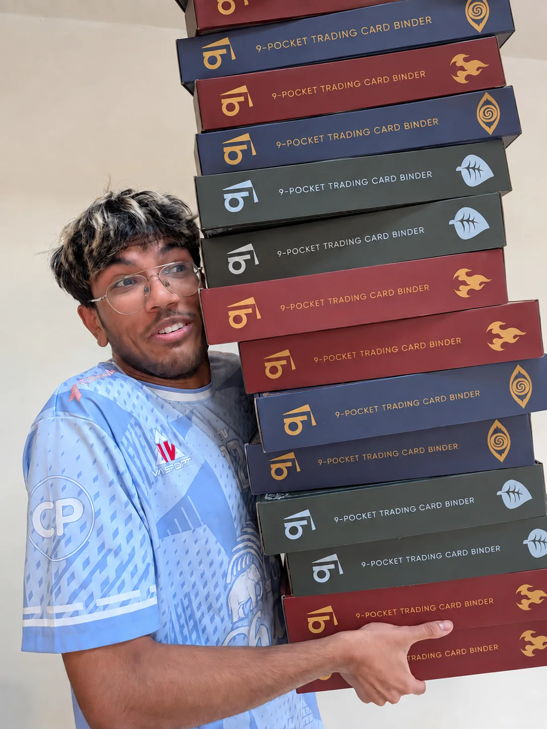 Adi beside a tall stack of BindSafe boxes